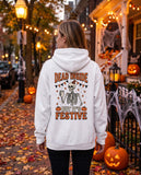 Person seen from behind in the white Dead Inside But It's Festive hoodie