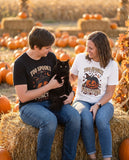 Two friends wearing the black and white Too Spooky To Function t-shirts