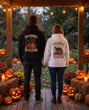 Two friends seen from behind in the black and white Too Spooky To Function hoodies