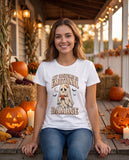 Person wearing the white My Costume Is Emotional Damage t-shirt