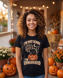 Person wearing the black I'm Not Scary I'm Unmedicated t-shirt