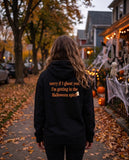 Person seen from behind in the black Sorry If I Ghost You hoodie