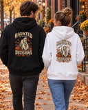 Couple walking down an autumn street in the black and white Haunted By My Own Decisions hoodies, back print