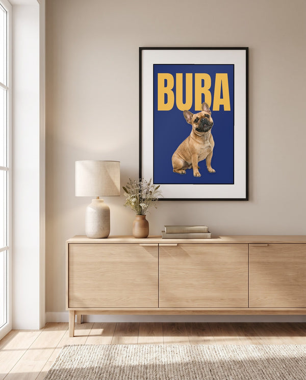 Framed pet name poster above a wooden cabinet in the living room