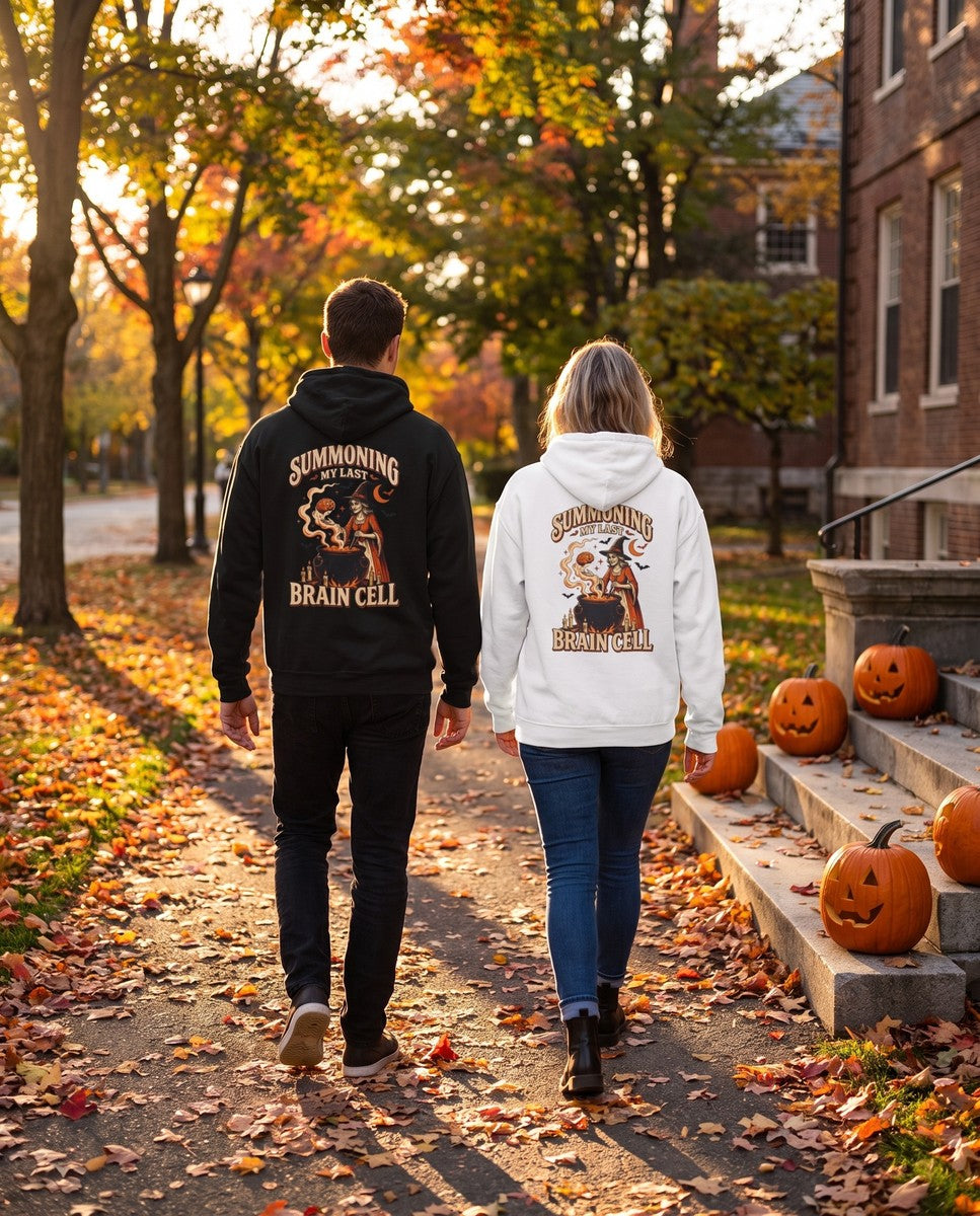 Two friends seen from behind in the black and white Summoning My Last Brain Cell hoodies