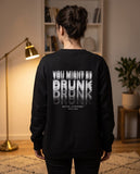 Person wearing the black You Might Be Drunk crewneck sweatshirt, seen from behind