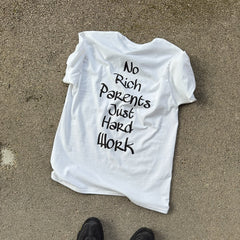 White No rich parents just hard work T-shirt with black brush lettering