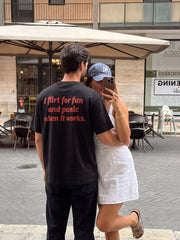 Black I flirt for fun and panic when it works T-shirt with red back print