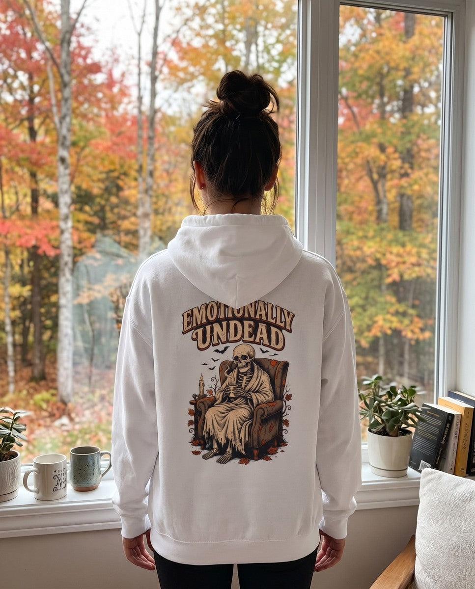 Person seen from behind in the white Emotionally Undead hoodie