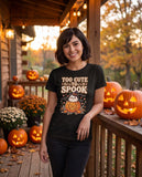 Person wearing the black Too Cute To Spook t-shirt