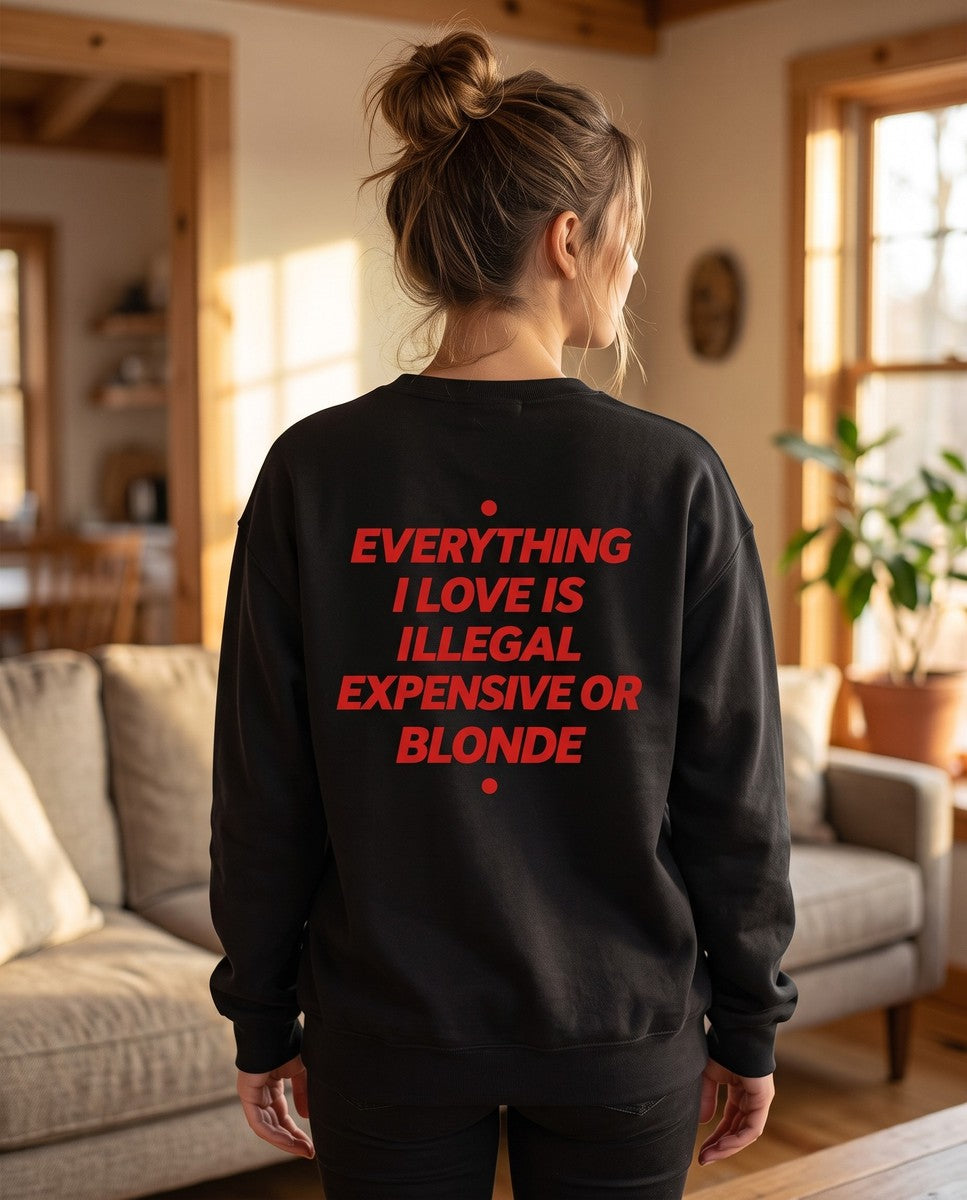 Person wearing the black Everything I Love Is Illegal Expensive Or Blonde crewneck sweatshirt, seen from behind