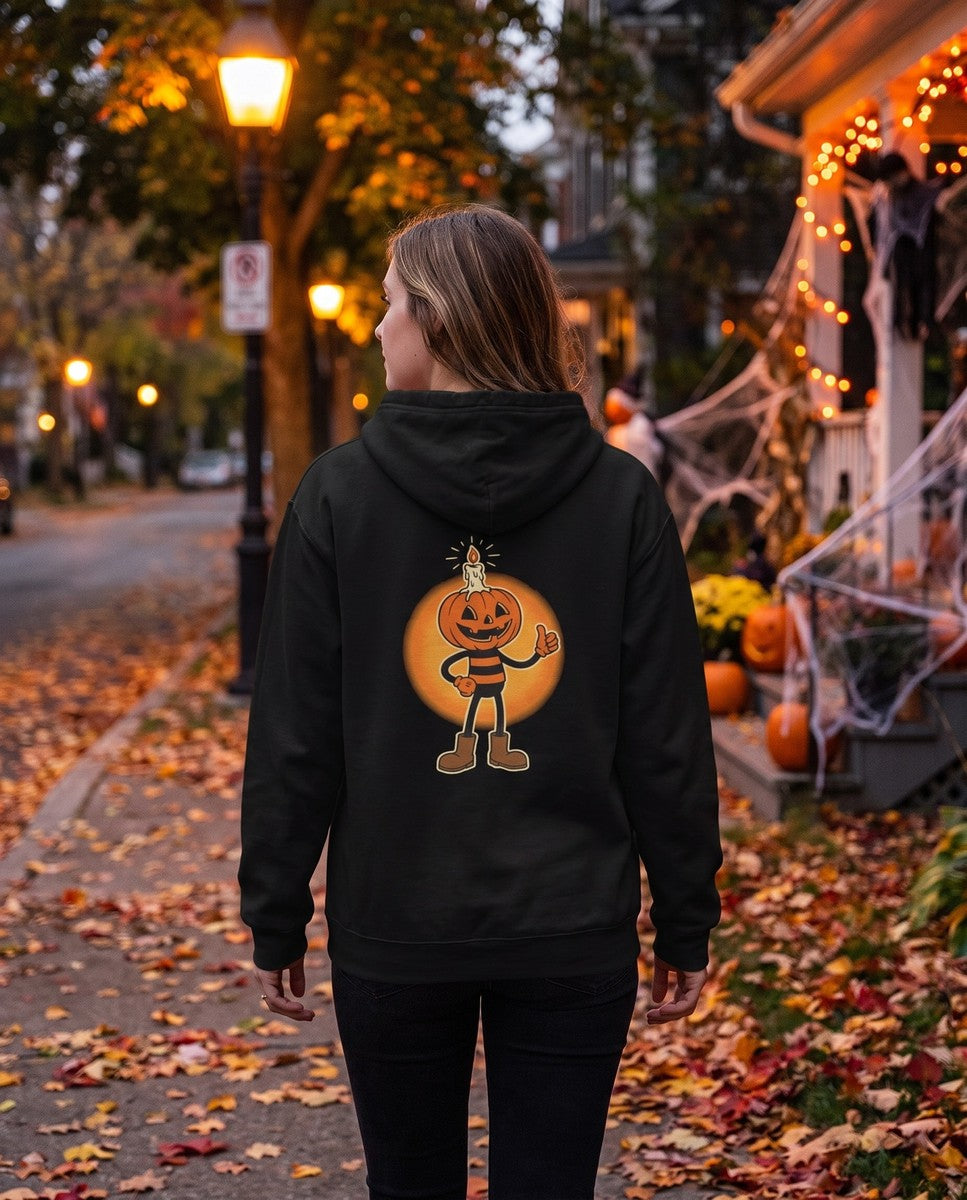 Person seen from behind in the black Pumpkin Candle Head hoodie