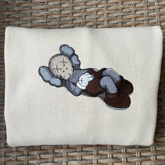 Kaws Laying