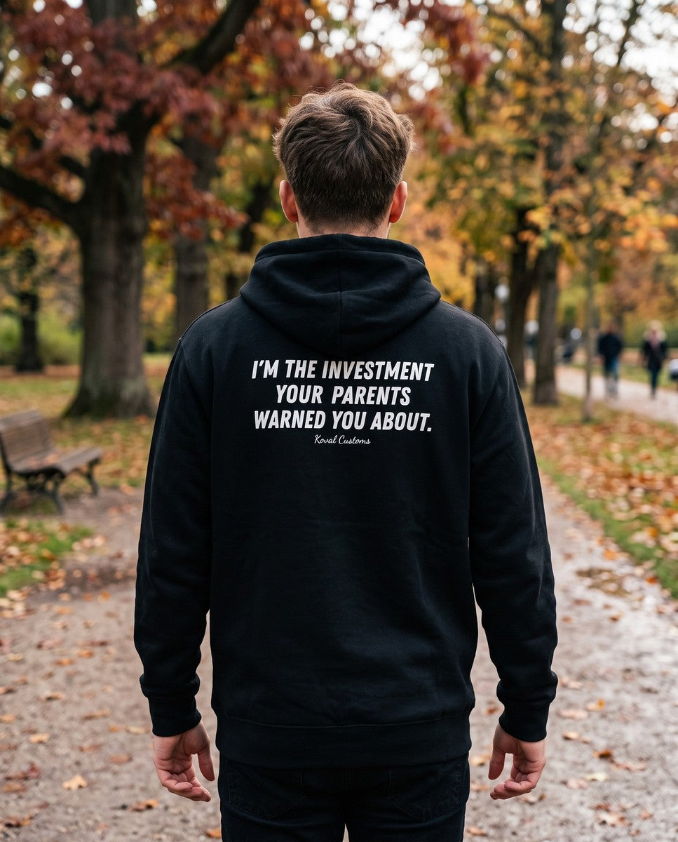 Man seen from behind wearing the black I'm The Investment Your Parents Warned You About hoodie