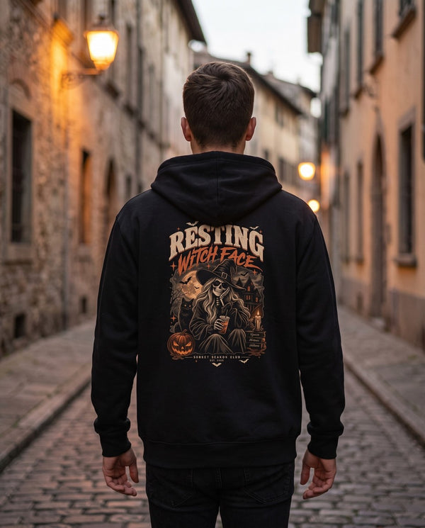 Person wearing the black Resting Witch Face zip hoodie, seen from behind