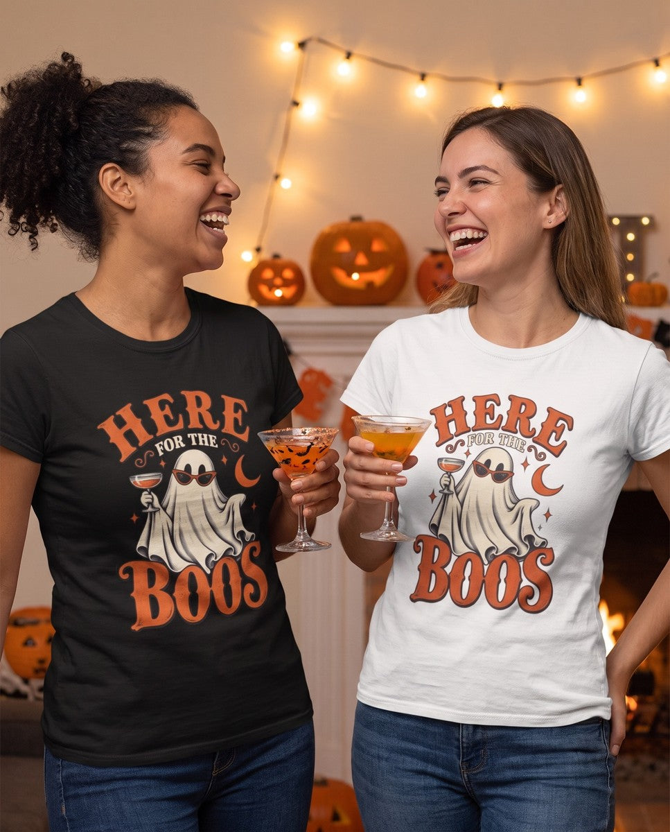Two friends wearing the black and white Here For The Boos t-shirts