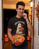 Person wearing the black Here For The Candy Not The People t-shirt