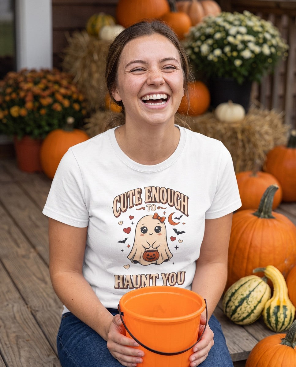 Person wearing the white Cute Enough To Haunt You t-shirt