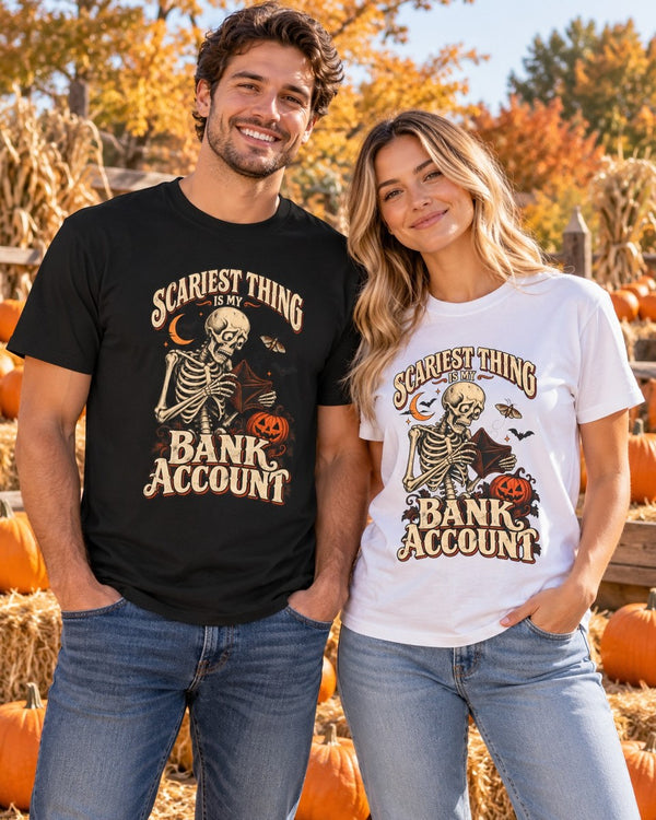 Couple at a pumpkin patch wearing the black and white Scariest Thing Is My Bank Account tees
