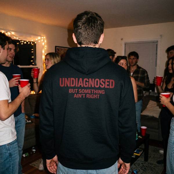 Wide party scene, black Undiagnosed hoodie back print among friends
